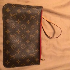 Clutch included with the Neverfull bag